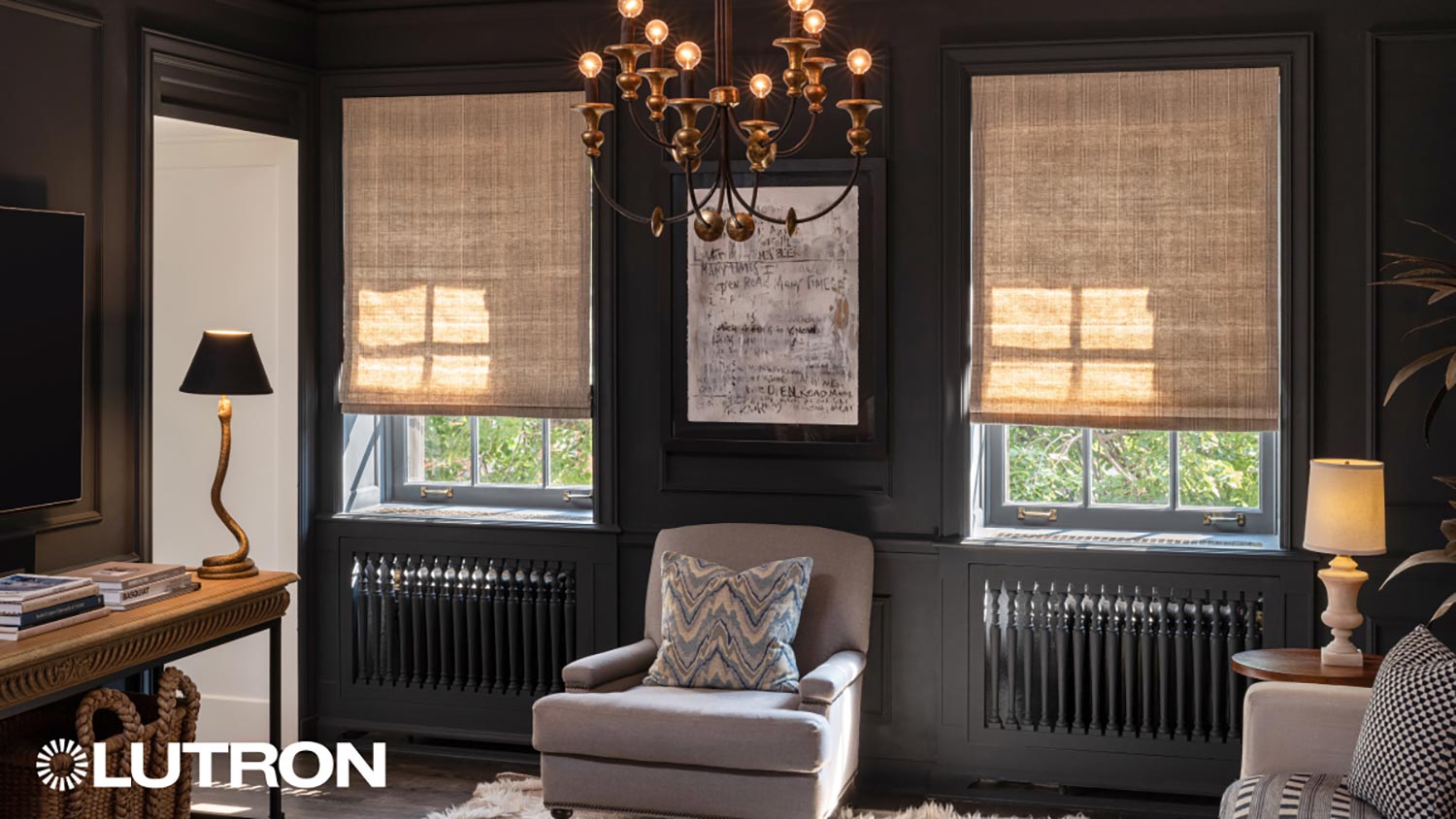 Traditional reading room with blackout shades, layered lighting, and dark wood trim