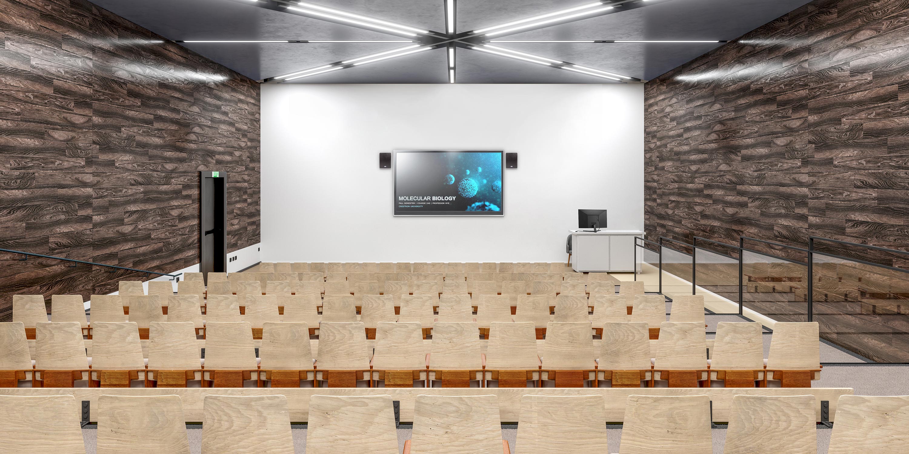Small auditorium with wooden seats and a presentation screen